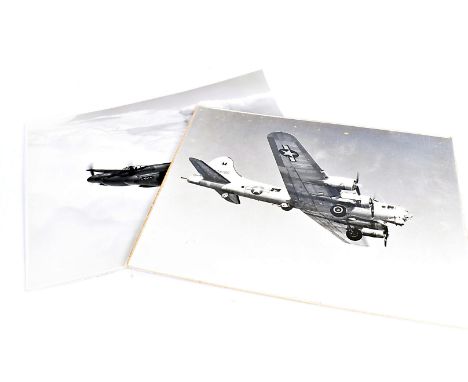 A collection of military related photographs and ephemera, including Army Aviation Flight Safety 1986 calendar, photo of the 