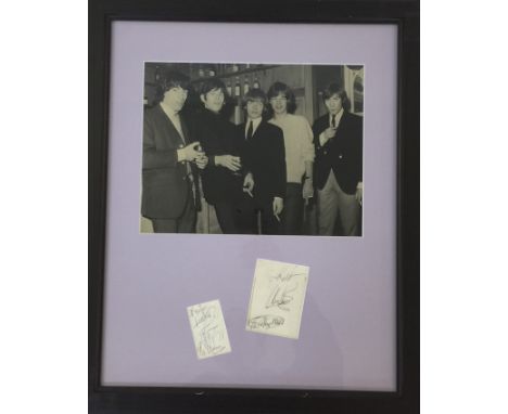 ROLLING STONES FRAMED AUTOGRAPHS - Mounted and framed display comprising of 12"x9" photo of the band in the 1960s and two aut