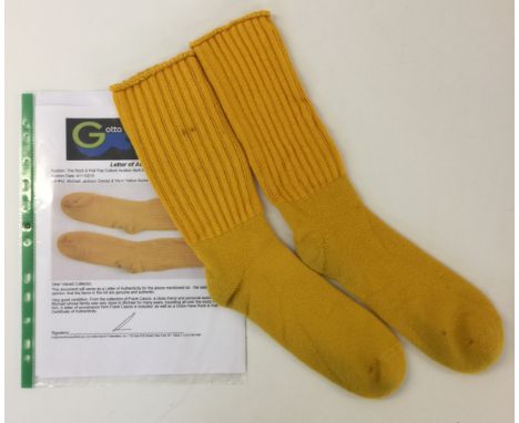MICHAEL JACKSON OWNED AND WORN SOCKS - A very fetching pair of yellow socks, owned and worn by Michael Jackson. Sold with let