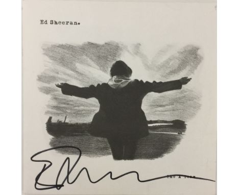 ED SHEERAN SIGNED RECORD SLEEVE - A 7" copy of Ed Sheeran's 'The A Team' single on Atlantic. The sleeve is signed on the fron