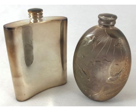 A late 19th/early 20th century E.P.B.M. oval hiip flask, embossed with swallows in flight, 13.5cm high;  another (2) 