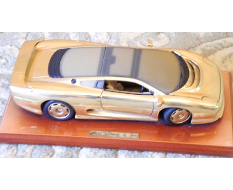 Jaguar XJ 220 1.18 scale gold  coloured model, 29cm wide 