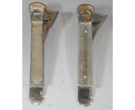 A silver mounted cigar cutter and pipe cleaner, engine turned in panels, Birmingham, 1985; another (2) 