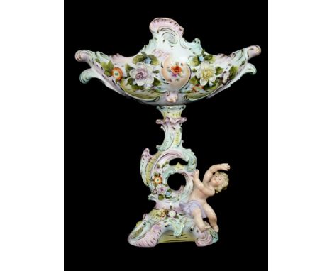 A German porcelain Centrepiece, the bowl of boat form on a figural stem and C scroll foot.  Encrusted with flowers and pale p