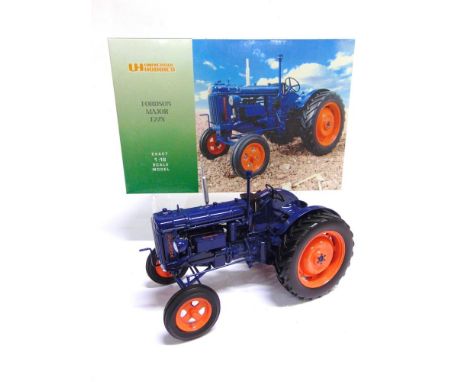 A 1/16 SCALE UNIVERSAL HOBBIES FORDSON MAJOR E27N  dark blue and orange, mint or near mint, boxed.