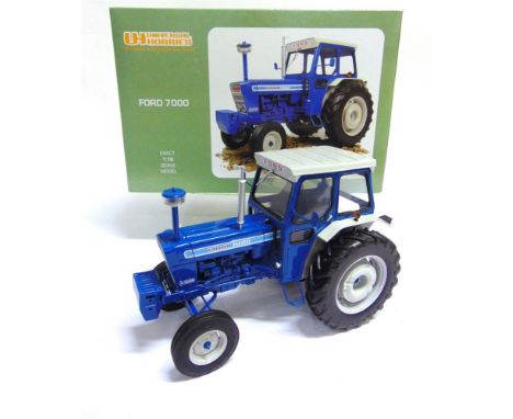 A 1/16 SCALE UNIVERSAL HOBBIES FORD 7000  blue and pale grey, mint or near mint, boxed.