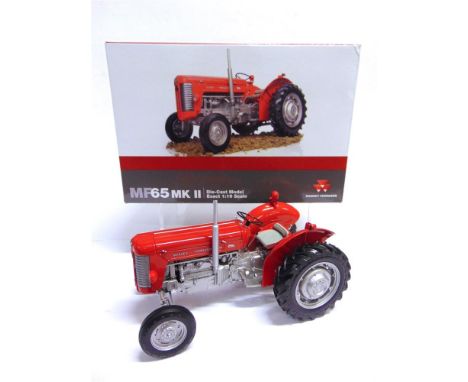 A 1/16 SCALE UNIVERSAL HOBBIES MASSEY FERGUSON 65 MK II  red and silver-grey, mint or near mint, boxed.