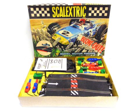 A SCALEXTRIC SET 40  comprising a No.C67, Lotus, red; No.C66, Cooper, blue; track and controllers, boxed as one (box lid with