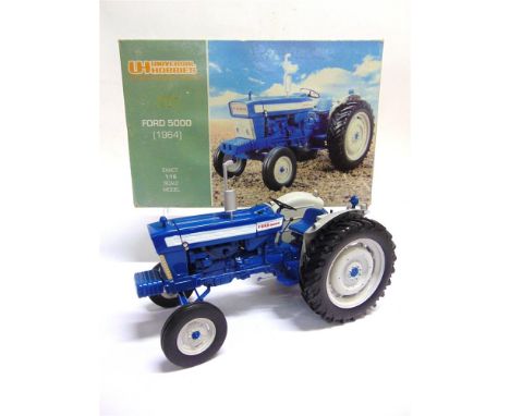 A 1/16 SCALE UNIVERSAL HOBBIES FORD 5000 6X (1964)  blue and pale grey, near mint, boxed. Condition Report : Two parts detach