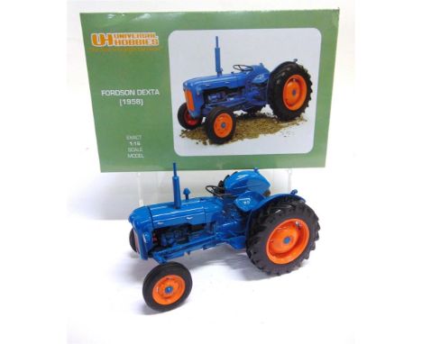 A 1/16 SCALE UNIVERSAL HOBBIES FORDSON DEXTA (1958)  blue and orange, mint or near mint, boxed.