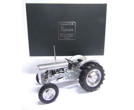 A 1/16 SCALE UNIVERSAL HOBBIES MASSEY FERGUSON TO35, 60TH ANNIVERSARY  silver, limited edition of 999, mint or near mint, box