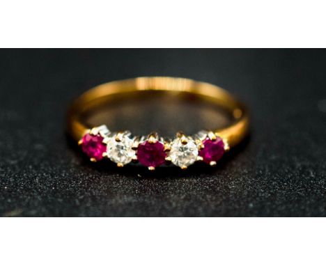9CT YELLOW GOLD LINEAR-SET 5-STONE RUBY AND DIAMOND RING, boxed. R/C rubies 0.30ct approx. RBC diamonds 0.20ct approx.