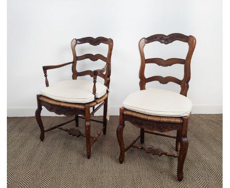 DINING CHAIRS, a set of eight, including two armchairs with ladder backs in Louis XV provincial style with carved detail and 