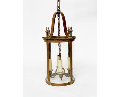 HALL LANTERN, Georgian style circular drum form glazed and metal framed with urn decoration (excluding chain), 65cm H.