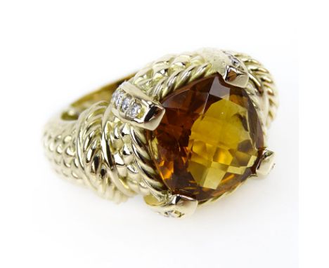 Vintage Criss Cross Cushion Cut Citrine, Diamond and 14 Karat Yellow Gold Ring. Unsigned. Good vintage condition. Ring size 2