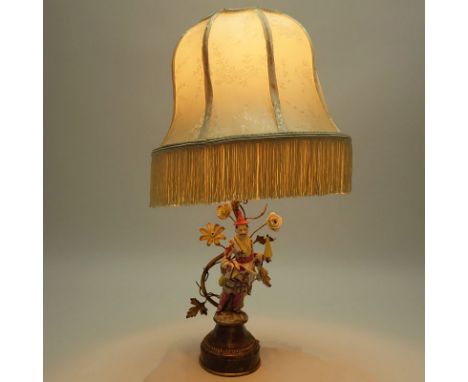 Antique Meissen Style Porcelain Figural lamp on Marble Base. Depicts a oriental postured male figure, gilt Bronze hardware an