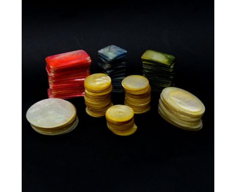 Lot of Hundred Thirty Six (136) Vintage Mother of Pearl Poker Chips. Natural wear, nicks and chips. Largest measures 2" Dia. 