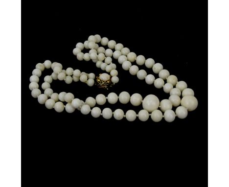 Vintage Double Strand Angelskin Coral Bead Necklace with 18 Karat Yellow Gold Clasp. Beads measure 6mm-14mm. Clasp signed 750