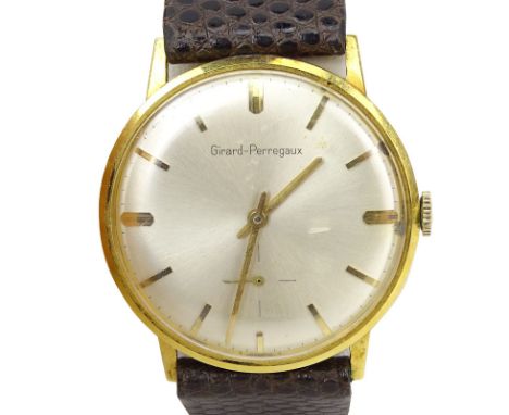 Man's Vintage Girard-Perregaux 14 Karat Yellow Gold Manual Movement Watch with Lizard Strap. Case measures 33mm. Surface wear