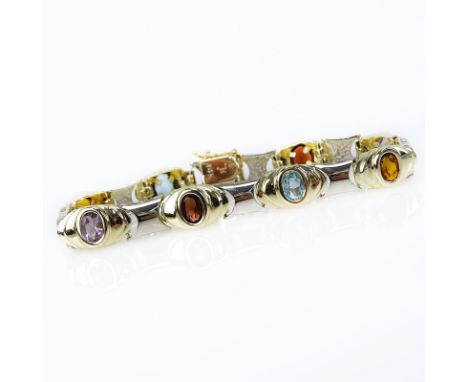 Vintage 14 Karat Yellow and White Gold Link Bracelet Set with Oval Cut Multi Gemstones. Stamped 14K. Surface wear from normal