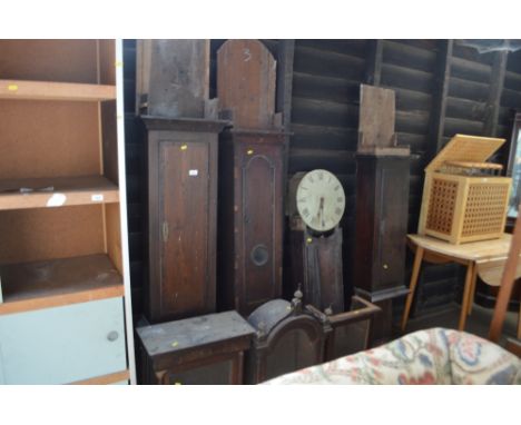 Four various 19th Century clock cases 