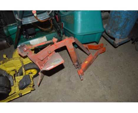 A single furrow plough for a lawn tractor 