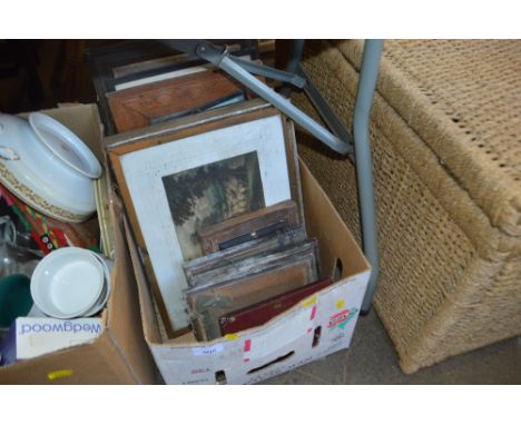 A box of various pictures and prints