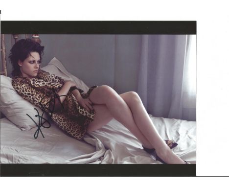 Kristen Stewart signed 10x8 colour photo. American actress and director. She is the recipient of several accolades, including