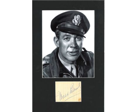 Ward Bond signature piece mounted below b/w photo. Approx overall size 16x12. Good Condition. All autographs are genuine hand