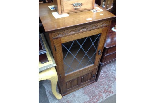 An Oak Hi Fi Cabinet With Leaded Gl And Linen Fold Panel Doors Leaded Gl And Linen Fold Panel Doors