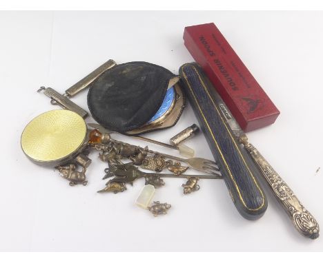 Silver and canary yellow enamel compact, Birmingham 1930, another, blue, apparently unused, 1945, various charms and small it