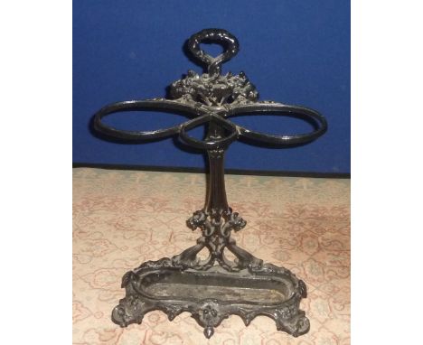 Reproduction cast metal stick stand.