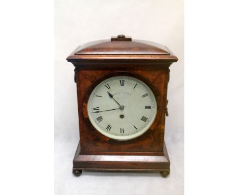 Eight day mantel clock by Reid and Todd, Glasgow. Anchor fuse movement with round painted dial in mahogany and rosewood cross