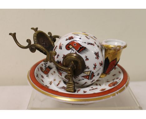 Continental porcelain tipping inkwell with gilt metal mounts, Impressed F & M, 15cm. Condition Report. Worn gilt and enamel, 