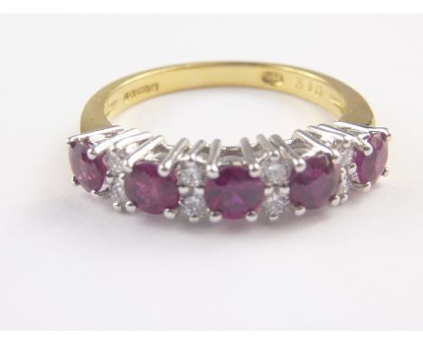 Diamond and five stone ruby ring with four pairs of diamond brilliants in 18ct white gold, size L.