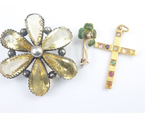 Gold and gem set cross, enamel flower brooch and a citrine flower brooch. (3)