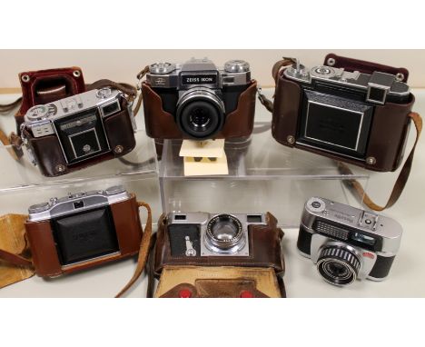 Collection of various vintage cameras including Zeiss, Contax, Ikon, Agfa, Braun etc.