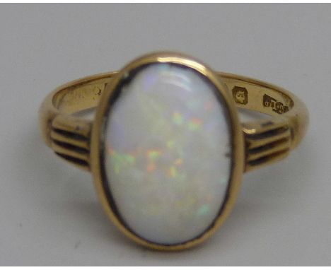 An 18ct gold opal cabochon ring, Chester 1913, 3.4g, O 