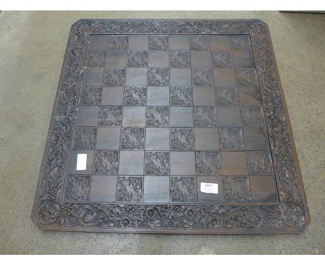 A large resin chessboard **PLEASE NOTE THIS LOT IS NOT ELIGIBLE FOR POSTING AND PACKING** 