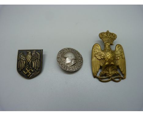 An Italian Fascist Youth Opera Balika badge, eagle and crown badge (possibly Austrian) and a German eagle helmet type badge 