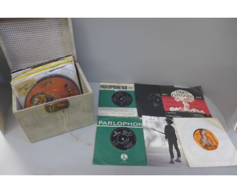 Thirty vinyl 7" singles, in vintage case, Rock, Pop and Reggae including The Beatles, Bowie, The Cure, Liam Gallagher, The Ja