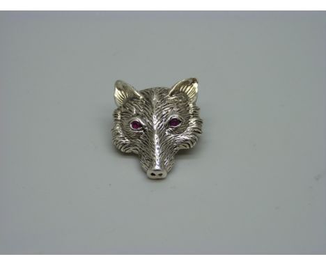 A silver fox head brooch/pendant with ruby eyes 