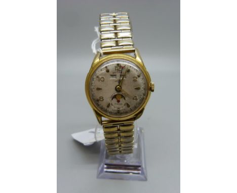 A gentleman's Rotary calendar day/date moon wristwatch, the case back bears inscription dated 1953 