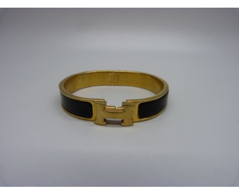 A vintage Hermes Chic bangle 