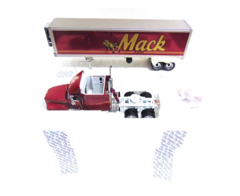 TWO 1/32 SCALE FRANKLIN MINT ARTICULATED TRUCKS  comprising a Kenworth T600 Tractor and Trailer and a Mack Elite CL613 Tracto