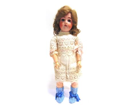 AN ALT, BECK &amp; GOTTSCHALCK BISQUE SOCKET HEAD DOLL  with a long light brown wig, sleeping grey glass eyes, and an open mo