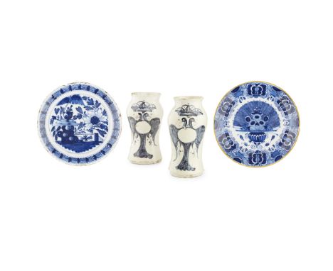 GROUP OF CONTINENTAL TIN-GLAZED POTTERY  18TH CENTURY   comprising a pair of Spanish maiolica albarelli of baluster shape, de
