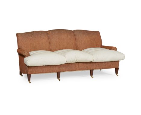 WHYTOCK &amp; REID THREE SEAT SOFA  20TH CENTURY   the triple arched back above a loose cushion seat and low scroll arms, rai