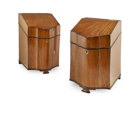 PAIR OF GEORGE III SATINWOOD BANDED KNIFE BOXES  LATE 18TH CENTURY   of serpentine outline, the sloped lids opening to fitted