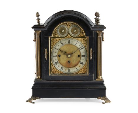 LATE VICTORIAN EBONISED BRASS MOUNTED CHIMING BRACKET CLOCK  LATE 19TH CENTURY   the moulded arched case with flame finials a